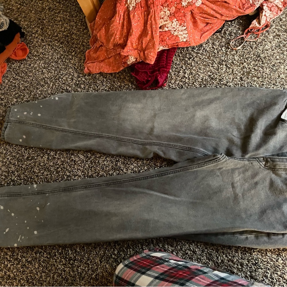 Strait leg grey jeans, bleach stained